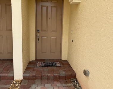9519 Sw Merlin Court - Photo Thumbnail 2