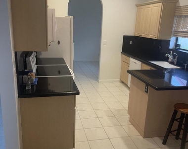 10215 Camelback Lane - Photo Thumbnail 1