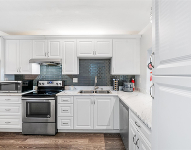 8437 Forest Hills Drive - Photo Thumbnail 2