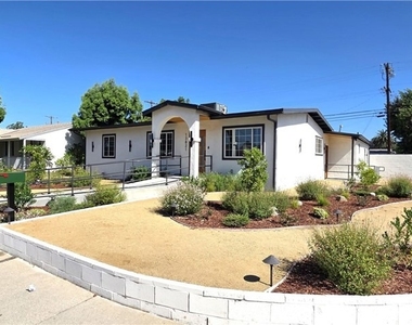 13821 Burton Street - Photo Thumbnail 1