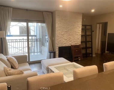 141 S Clark Drive - Photo Thumbnail 2