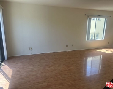 8515 Saturn Street - Photo Thumbnail 2