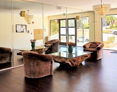 10475 Ashton Avenue - Photo Thumbnail 2