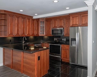 5000 Townhouse Drive - Photo Thumbnail 1
