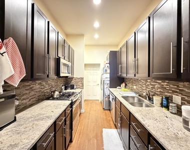 1415 N Campbell Avenue - Photo Thumbnail 1