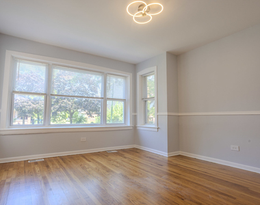 1523 E 74th Place - Photo Thumbnail 1