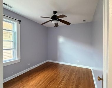 5540 N Luna Avenue - Photo Thumbnail 4