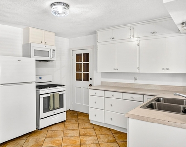 1064 Sycamore St - Photo Thumbnail 5