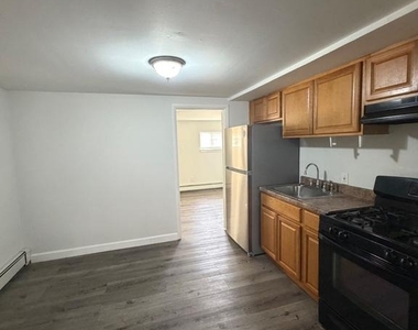 6016 N Warnock Street - Photo Thumbnail 4