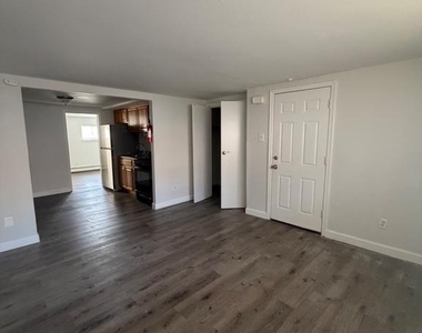 6016 N Warnock Street - Photo Thumbnail 2