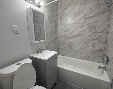 6020 N Warnock Street - Photo Thumbnail 3