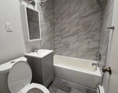 6020 N Warnock Street - Photo Thumbnail 1