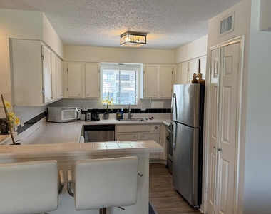 12100 Melville Drive - Photo Thumbnail 1