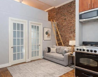 W 14TH ST. - Photo Thumbnail 1