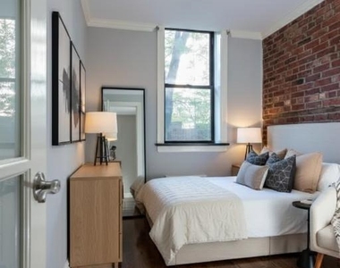 W 14TH ST. - Photo Thumbnail 2