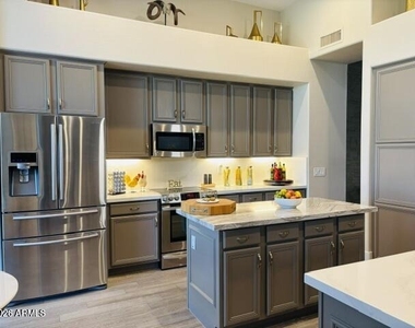 9311 E Whitewing Drive - Photo Thumbnail 2