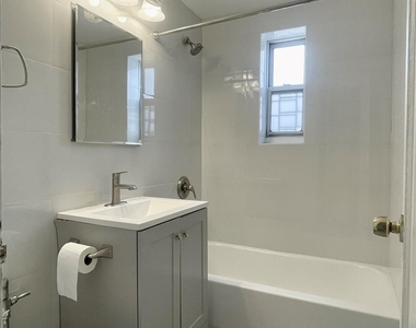 111-05 66th Avenue - Photo Thumbnail 2