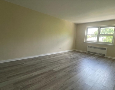 111-05 66th Avenue - Photo Thumbnail 4
