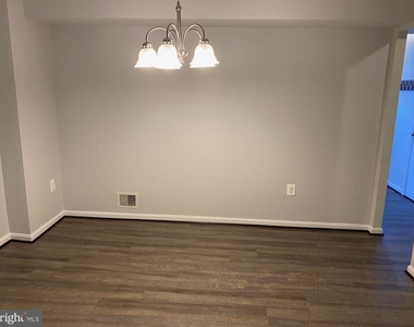 1210 Thomas Jefferson Place - Photo Thumbnail 2