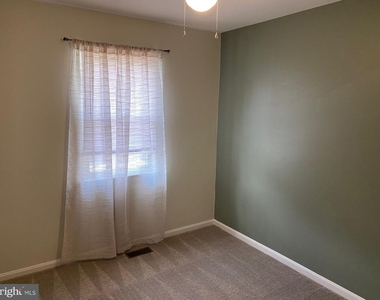 1210 Thomas Jefferson Place - Photo Thumbnail 4