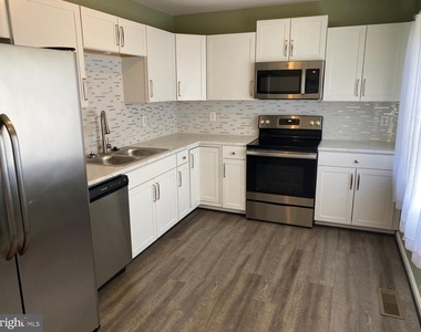 1210 Thomas Jefferson Place - Photo Thumbnail 1