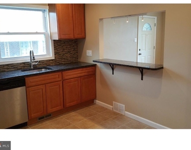 9960 Woodfern Road - Photo Thumbnail 1