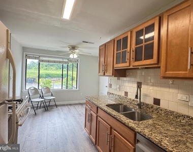 8723 Hayshed Lane - Photo Thumbnail 9