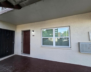 9009 Tudor Drive - Photo Thumbnail 1