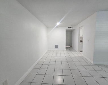 9009 Tudor Drive - Photo Thumbnail 3