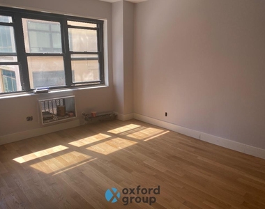 E 38th St. - Photo Thumbnail 6