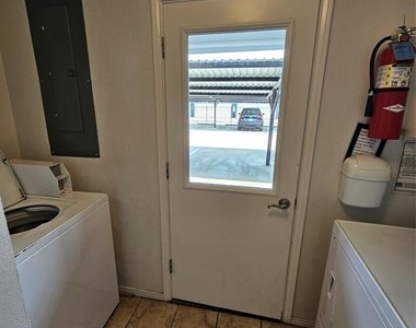 6033 Sandhurst Lane - Photo Thumbnail 3