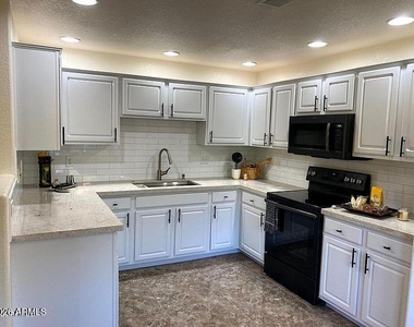 9555 E Raintree Drive - Photo Thumbnail 3