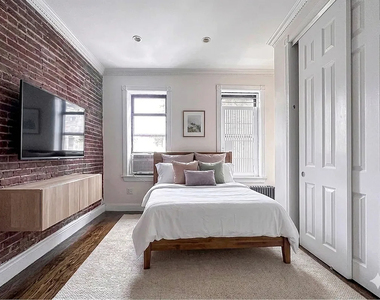 344 East 55th Street - Photo Thumbnail 2
