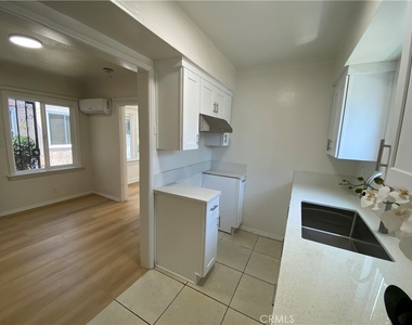 1366 W 37th - Photo Thumbnail 4