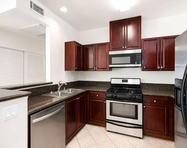13941 Sherman Way - Photo Thumbnail 2