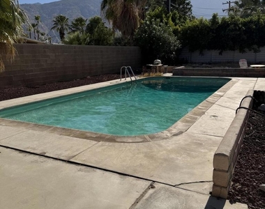 897 E Racquet Club Road - Photo Thumbnail 1