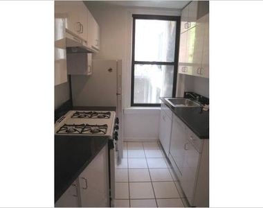 E 37th St - Photo Thumbnail 1