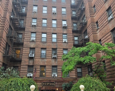 99-63 66th Avenue - Photo Thumbnail 7