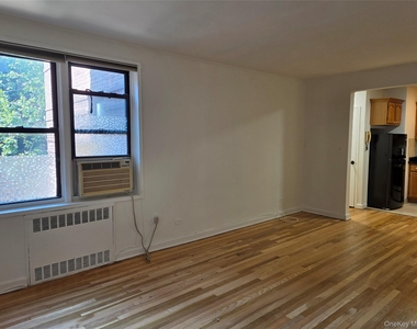 99-63 66th Avenue - Photo Thumbnail 4