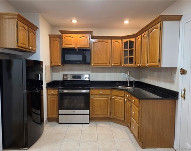 99-63 66th Avenue - Photo Thumbnail 6