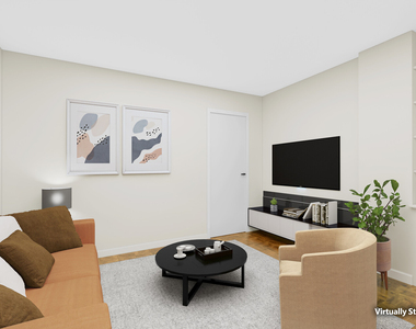 211 E 53rd Street - Photo Thumbnail 2