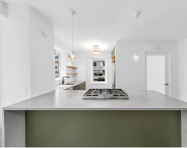 411 E 53rd Street - Photo Thumbnail 2