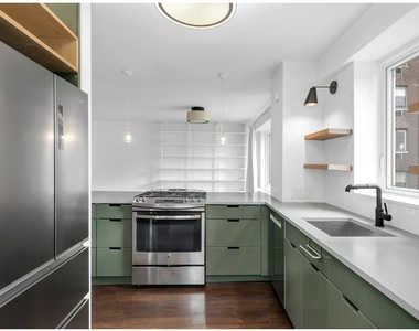 411 E 53rd Street - Photo Thumbnail 3