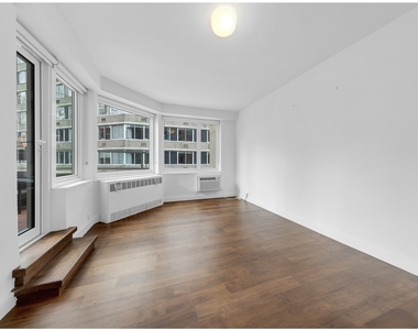 411 E 53rd Street - Photo Thumbnail 5