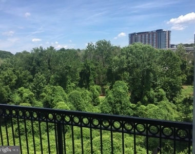 1591 Spring Gate Drive - Photo Thumbnail 1