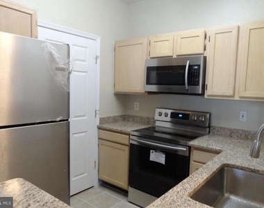 1591 Spring Gate Drive - Photo Thumbnail 5