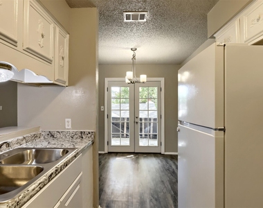 1302 Radcliff Dr - Photo Thumbnail 4