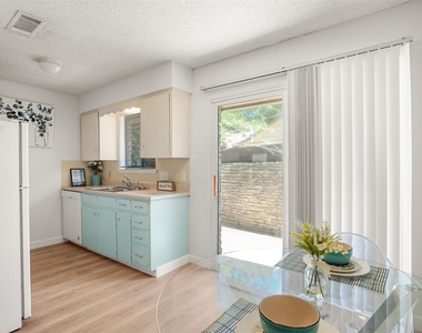 8603 Woodstone Dr - Photo Thumbnail 2
