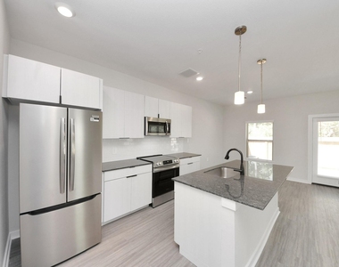 7711 Longmire Road - Photo Thumbnail 11