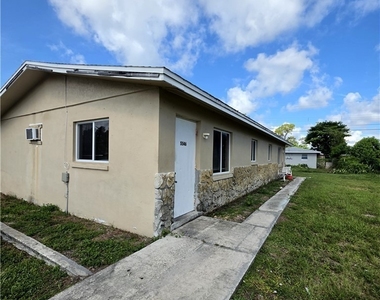 5546 6th Avenue - Photo Thumbnail 1